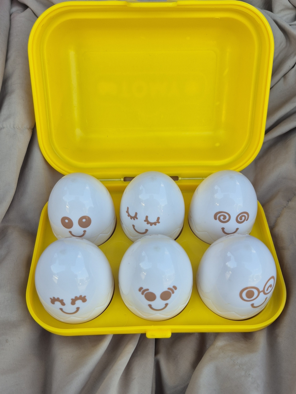 Yellow Carry Case with White Emoji Surprise Eggs – Fun Learning Toy